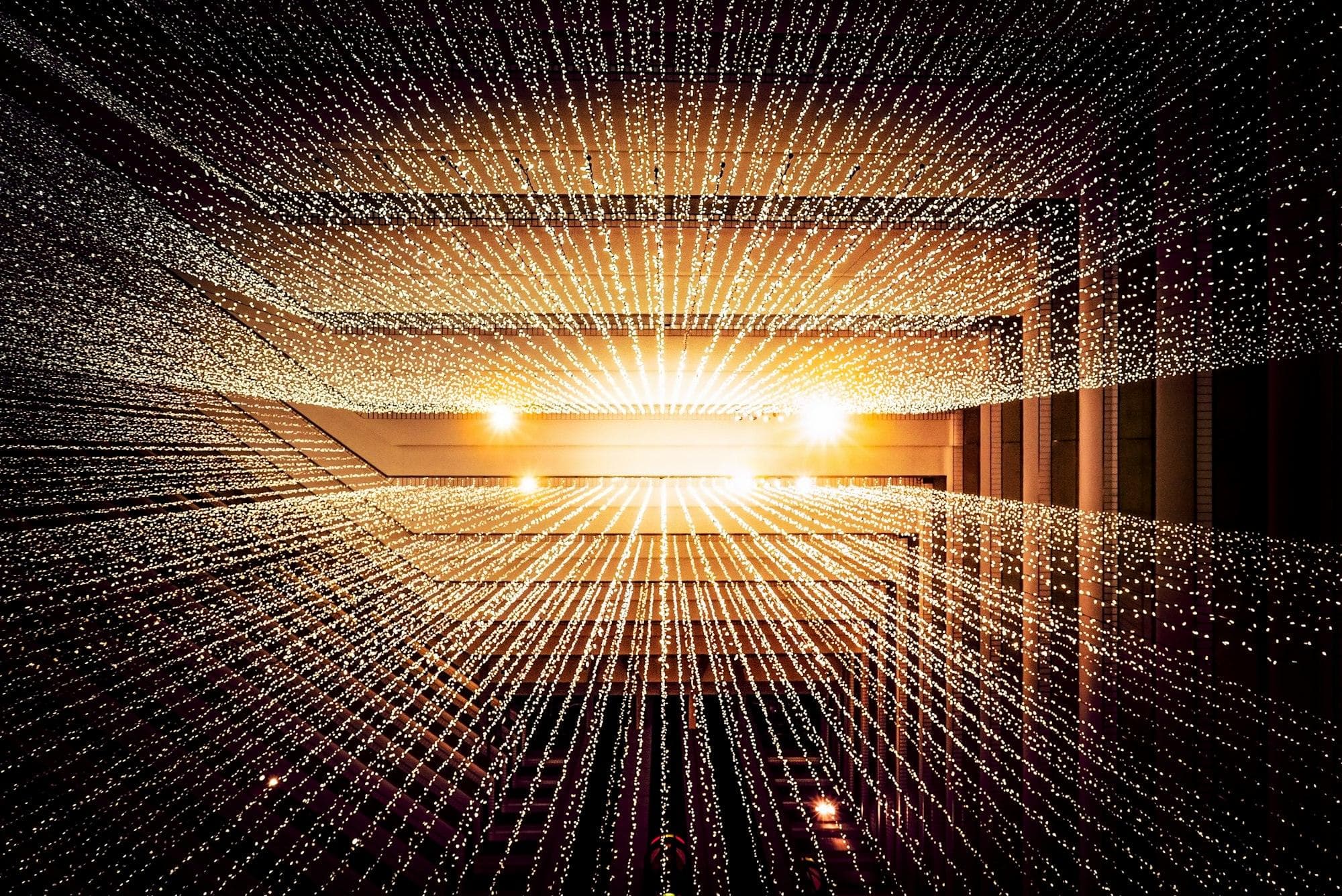 Abstract streams of light converging, suggesting data in motion