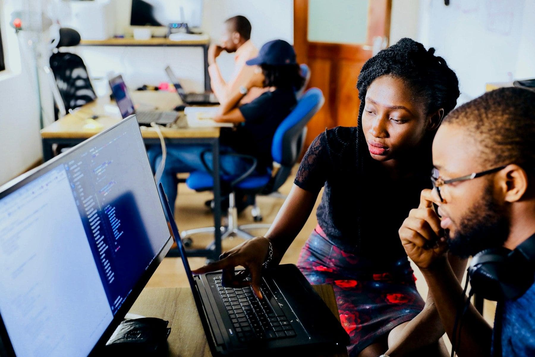 Students working together at a computer